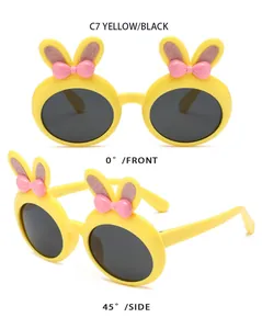Front and side angles of cute yellow bunny ear sunglasses showing soft silicone details.