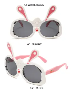 Front and side views of white rabbit-shaped children's sunglasses with pink accents.