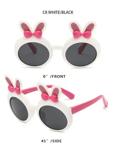 Detailed views of kids white bunny ear sunglasses with pink bows from front and side angles