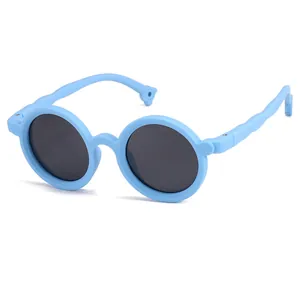Round light blue silicone children's polarized sunglasses with UV protection for kids