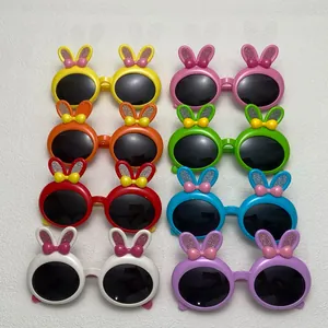 Set of 8 colorful kids' polarized sunglasses with cute bunny ears and bow details for girls