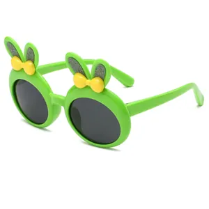 Cute green bunny ear children's sunglasses with a yellow bow and polarized lenses