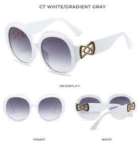White round frame women's sunglasses with gradient gray lenses, multi-angle view.