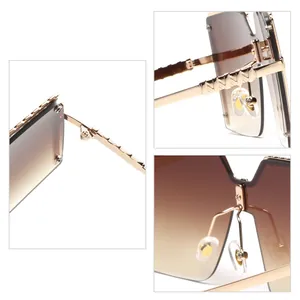 Oversized rimless children's sunglasses with metallic gold temples and gradient lenses