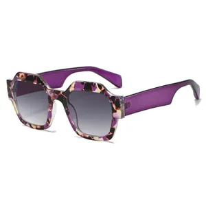 Stylish women's polygon sunglasses with purple floral patterned frames and UV protection
