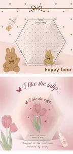 Close-up of pink mini portable 5-fold umbrella with cute bear and tulip designs
