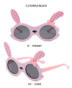 Detailansicht der süßen rosa Kaninchenohr-Kindersonnenbrille mit lila Gläsern und Schleife