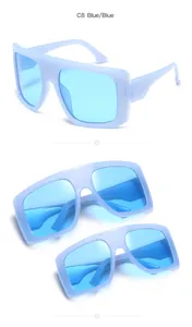 Close-up of kids oversized square sunglasses in translucent blue with blue lenses