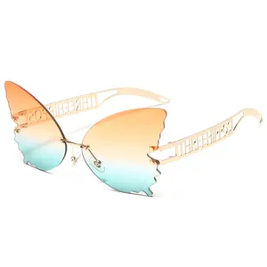 Gafas de sol de mariposa sin montura con patillas metálicas huecas y lentes degradadas