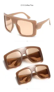 Detail view of oversized square kids sunglasses in coffee and tea brown tones