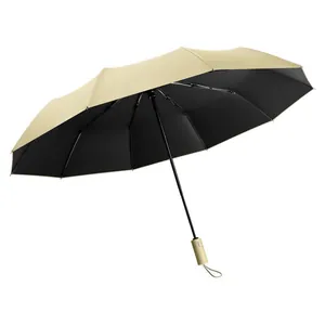 Fully automatic large reinforced beige umbrella with black UV coating for sun and rain