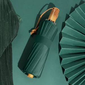 Elegant 16-rib dark green folding sun umbrella with bamboo handle and UV protection