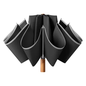 Durable 60-rib automatic inverted umbrella with elegant wooden handle for sun and rain