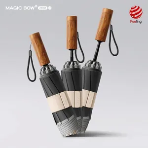 Automatic windproof folding umbrella with wood texture handle and safety anti-rebound