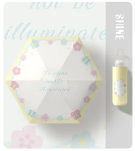 Portable capsule umbrella with floral butterfly print and matching storage case