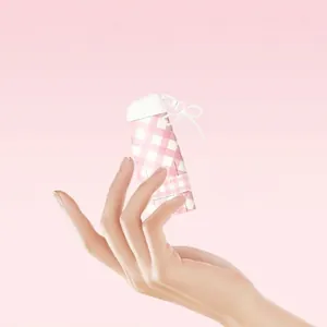 Compact mini pink plaid sun umbrella designed for UV protection and daily travel use