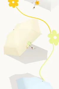 Close-up of portable flower bud sun umbrellas in pastel colors with floral buckles