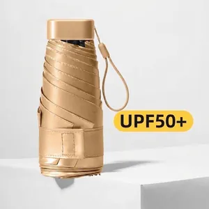 Premium portable 5-fold mini pocket umbrella in gold finish with UPF 50+ UV protection