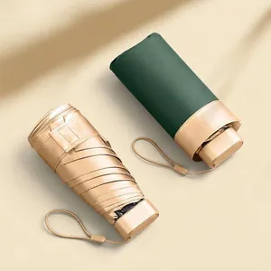 Compact UPF50+ folding pocket umbrella for sun and rain protection in elegant colors