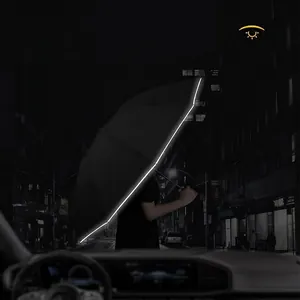 Black automatic folding umbrella featuring high-visibility reflective edge for night safety