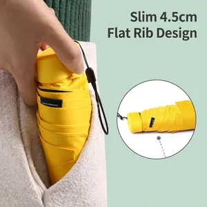 Ultra-slim 4.5cm flat capsule folding umbrella for sun and rain protection in yellow