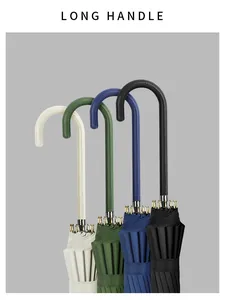 Close-up of four elegant long-handle umbrellas in cream, green, blue, and black colors.