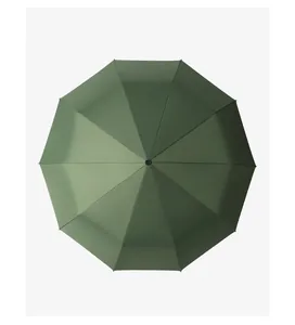 Top-down bird's-eye view showing the dark green octagonal folding umbrella canopy