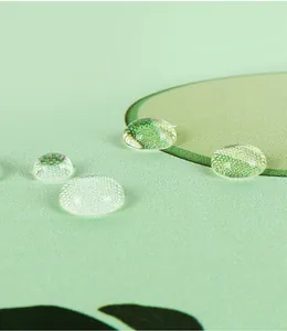 Close-up detail of waterproof fabric on compact umbrella showing water-repellent droplets