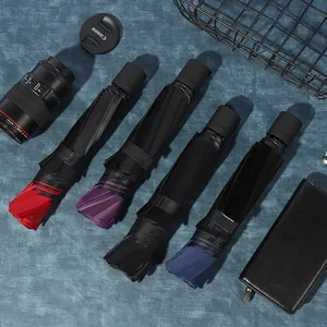 Sturdy large folding umbrellas in multiple colors for sun and rain protection displayed together