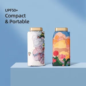 Compact UPF50+ foldable parasol with artistic floral patterns for sun and rain protection