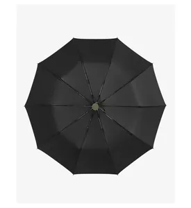 Top view of a large black automatic folding umbrella with 10 reinforced ribs