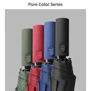Premium automatic folding umbrellas in solid green, red, blue, and black colors.