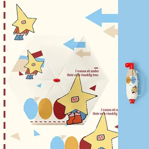 Close-up of cute star person cartoon pattern on cream 5-fold compact UV umbrella