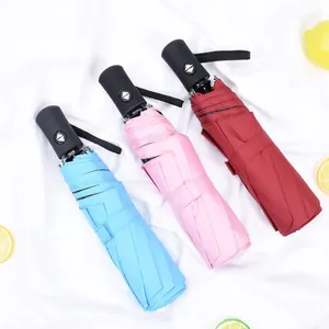 Set of 3 automatic folding umbrellas in blue pink and red for sun and rain protection