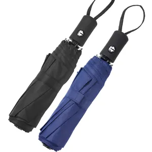 Paar automatische opvouwbare paraplu's in zwart en marineblauw voor zon en regen
