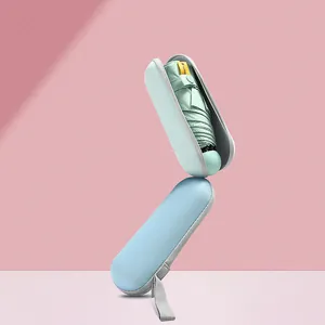 Compact foldable sun umbrella with UPF 50 protection in a portable capsule case