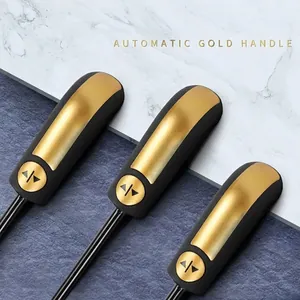 Professional automatic folding umbrella featuring a luxury gold and black ergonomic handle