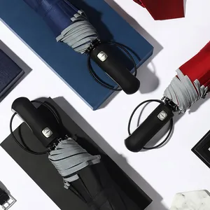 Grand parapluie pliant automatique avec bord réfléchissant pour le soleil et la pluie