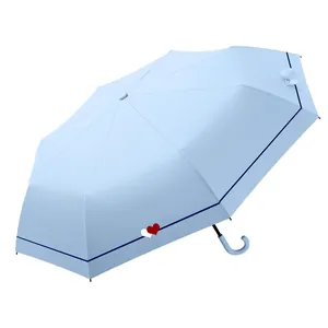Light blue folding UV protection umbrella with cute heart pattern and navy stripe