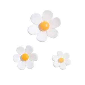 White resin daisy charms in three different sizes for DIY crafts and home decoration