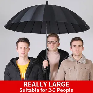 Large black 24-rib windproof straight umbrella demonstrated by three men for size scale