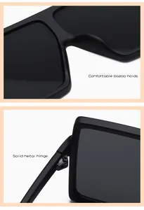Detailaufnahmen von Metallscharnier und bequemem Nasensteg der schwarzen Sonnenbrille.