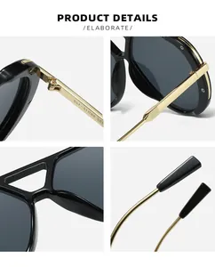 Close-up details of black sunglasses with gold metal hinges and double bridge design