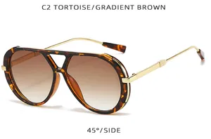 Vintage tortoise shell sunglasses for women with gradient brown lenses and gold temples