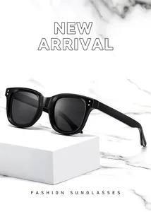 Close-up of stylish black square frame sunglasses on a premium modern marble background