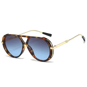 Retro tortoiseshell aviator sunglasses with blue gradient lenses and gold metal temples