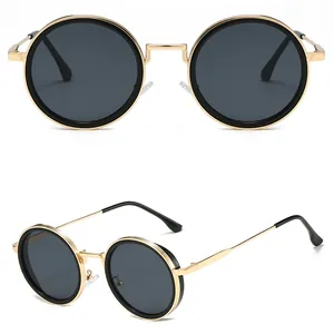 Retro ronde zonnebril met gouden montuur en grijze glazen voor zowel dames als heren.