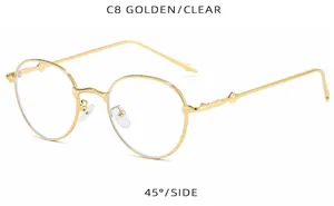 Vista detallada de 45 grados de gafas redondas retro de metal dorado con lentes transparentes.