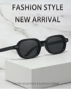 Black retro oval small-frame sunglasses with a minimalist and fashionable design