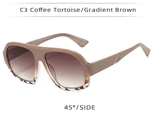 Detalle vista lateral 45 grados de gafas de sol carey café con lentes degradadas café.